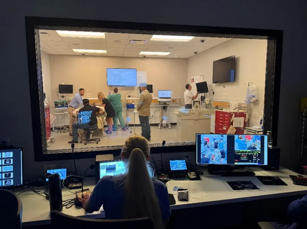 Legislators inside an operating room with doctors during a live demonstration